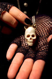 tiny skull in hands