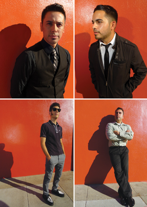 Four men pose individually in front of a bright orange wall; each is dressed in stylish, semi-formal or casual attire, casting distinct shadows on the sidewalk and wall.