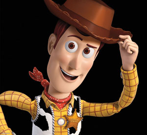 Animated cowboy character wearing a brown hat, yellow checkered shirt, red bandana, and sheriff star, smiling and tipping his hat against a black background.