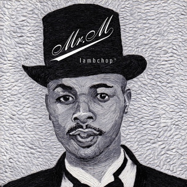 Black and white sketch of a man in a suit and top hat with Mr. M written on the hat in script and lambchop written below. The background is textured with swirling lines.