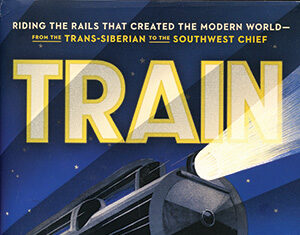 Book cover for Train by Tom Zoellner, featuring a stylized black locomotive with glowing headlights speeding forward at night, with bold yellow and white title text above.