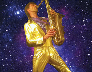 A person in a shiny gold jumpsuit plays a saxophone against a vibrant, star-filled outer space background.