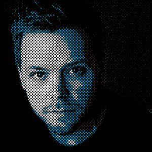 A portrait of a man rendered in a halftone pattern, with blue and white dots creating highlights on his face against a black background.