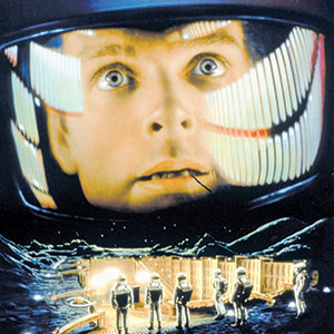 A close-up of an astronauts face reflected in a helmet visor, with wide, intense eyes. Below, several astronauts in spacesuits stand on a futuristic moon base with bright lights.