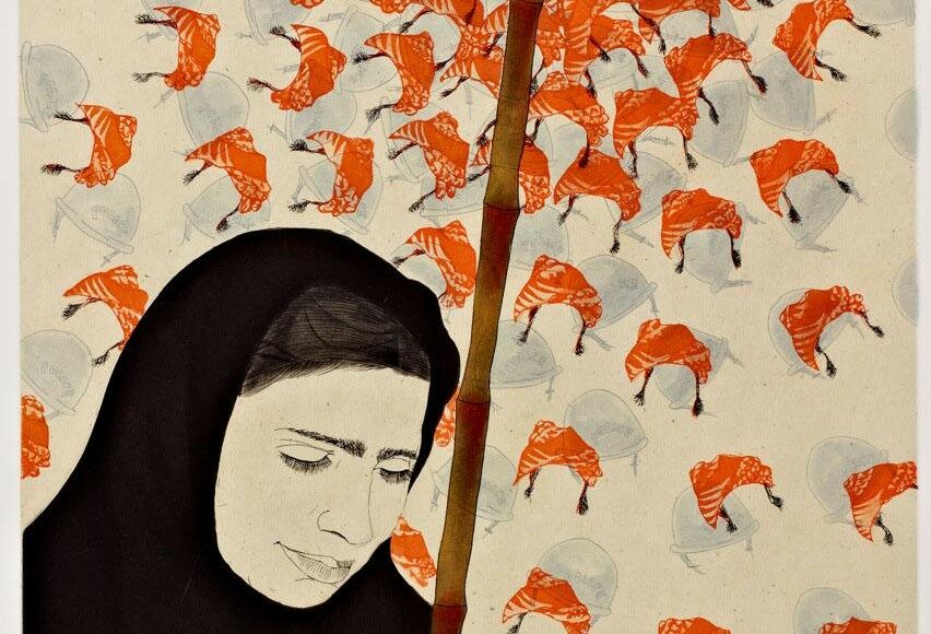 A woman in a black headscarf with closed eyes stands beside a large bamboo pole. Behind her, numerous orange and white patterned scarves float in the air, some appearing to cover transparent helmets.