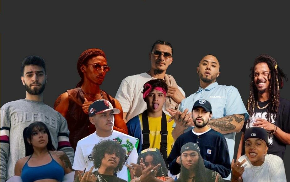 A group of thirteen young adults pose confidently against a plain dark background, wearing casual and streetwear outfits, including t-shirts, hoodies, caps, and sunglasses. Some make hand signs or gesture expressively.