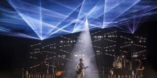 Photo of musicians on a big stage