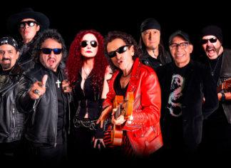 Eight musicians standing together