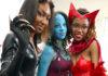 Three women dressed as science fiction/superhero costumes