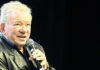 William Shatner speaking into a microphone