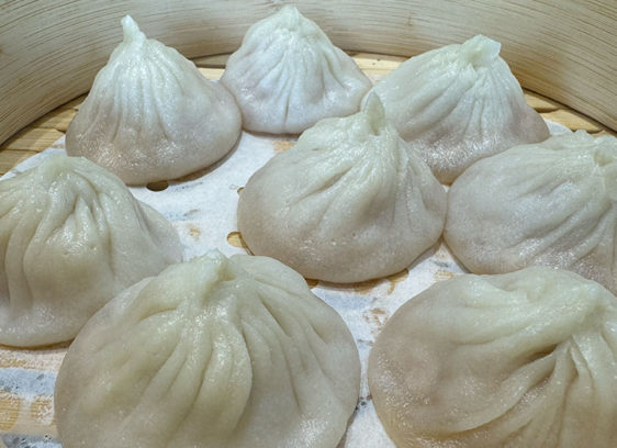 Serving container with eight soup dumplings