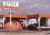 Vintage photo of a hot dog stand in a dome-shaped building