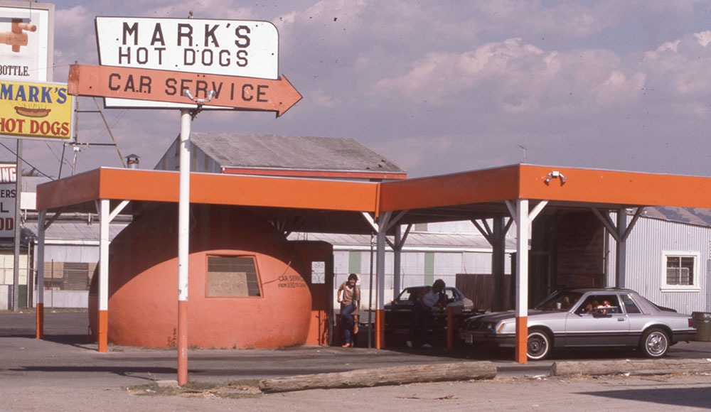 Vintage photo of a hot dog stand in a dome-shaped building