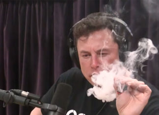 Elon Musk blowing smoke
