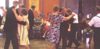 Snapshot of people dancing at an event