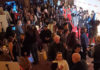 Crowd at a film festival premiere, seen from overhead