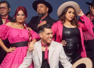 Band photo of six musicians in colorful attire