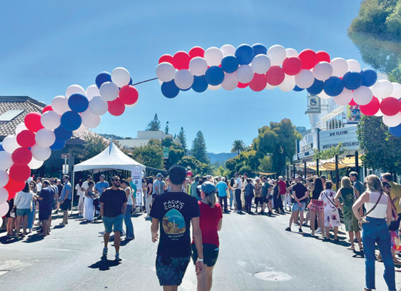 Street fair with balloons and booths