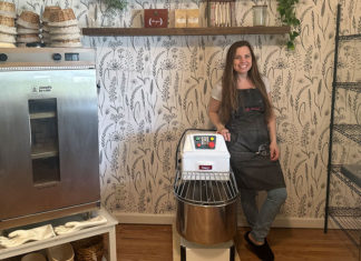 Woman in a kitchen with equipment for bread mating