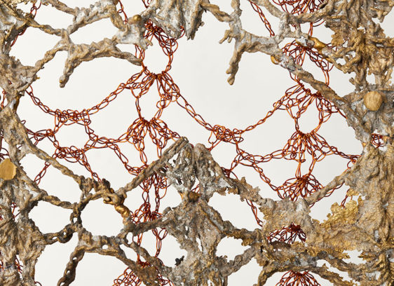 Detail of sculpture made of cast bronze and crocheted copper wire