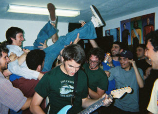 Musicians mingling with members of the audience