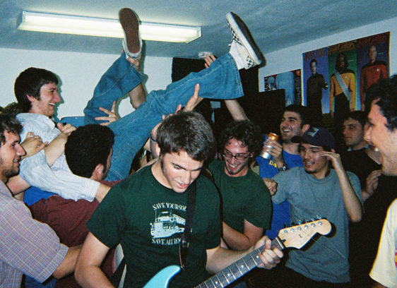 Musicians mingling with members of the audience