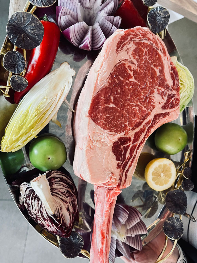 Uncooked steak and vegetables, ready for cooking