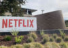 Photo of office building with Netflix sign in front