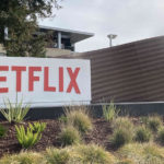 Photo of office building with Netflix sign in front