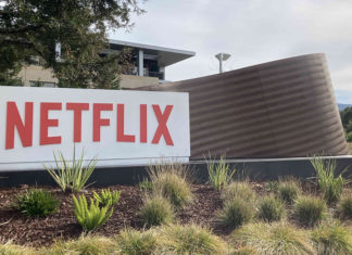 Photo of office building with Netflix sign in front