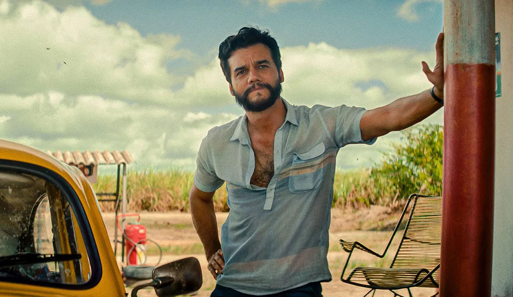 Man standing outside by a car