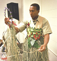 Red tries on a grassy number